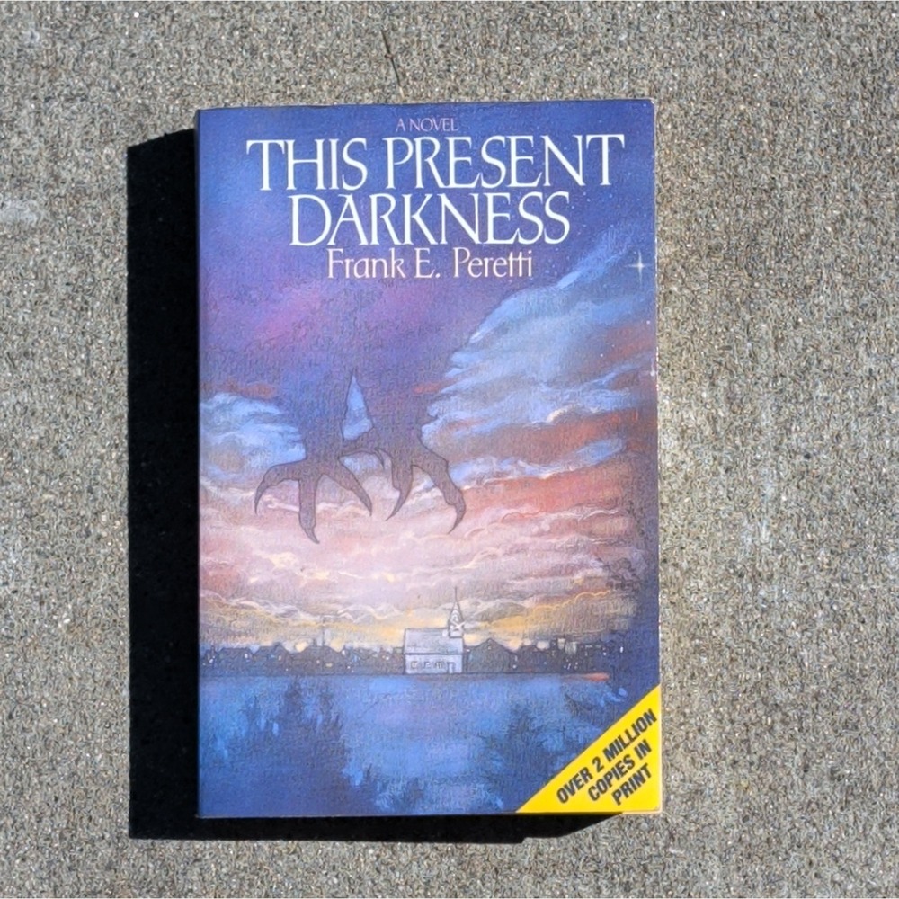 This Present Darkness By Frank E. Peretti PB